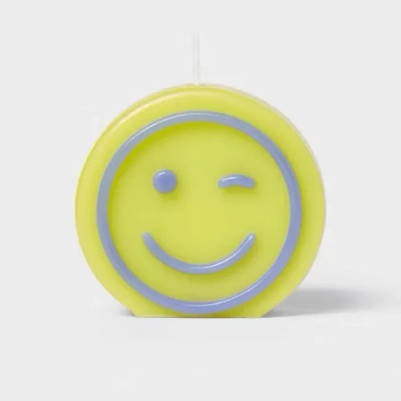 Green smiley candle